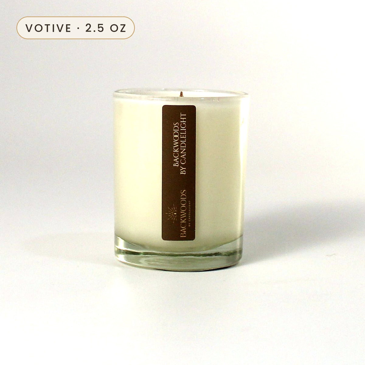 Backwoods By Candlelight 2.5 oz votive candle with wooden wick