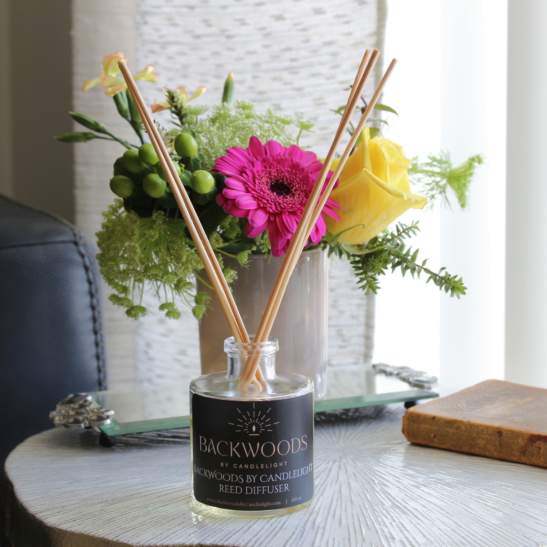 Non-toxic reed diffuser, natural reed diffuser sticks, white background. Backwoods By Candlelight reed diffuser.