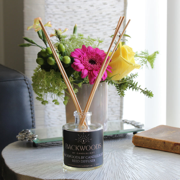 Non-toxic reed diffuser, natural reed diffuser sticks, white background. Backwoods By Candlelight reed diffuser.