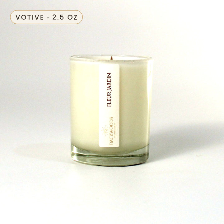 Fleur Jardin 2.5 oz votive candle with wooden wick