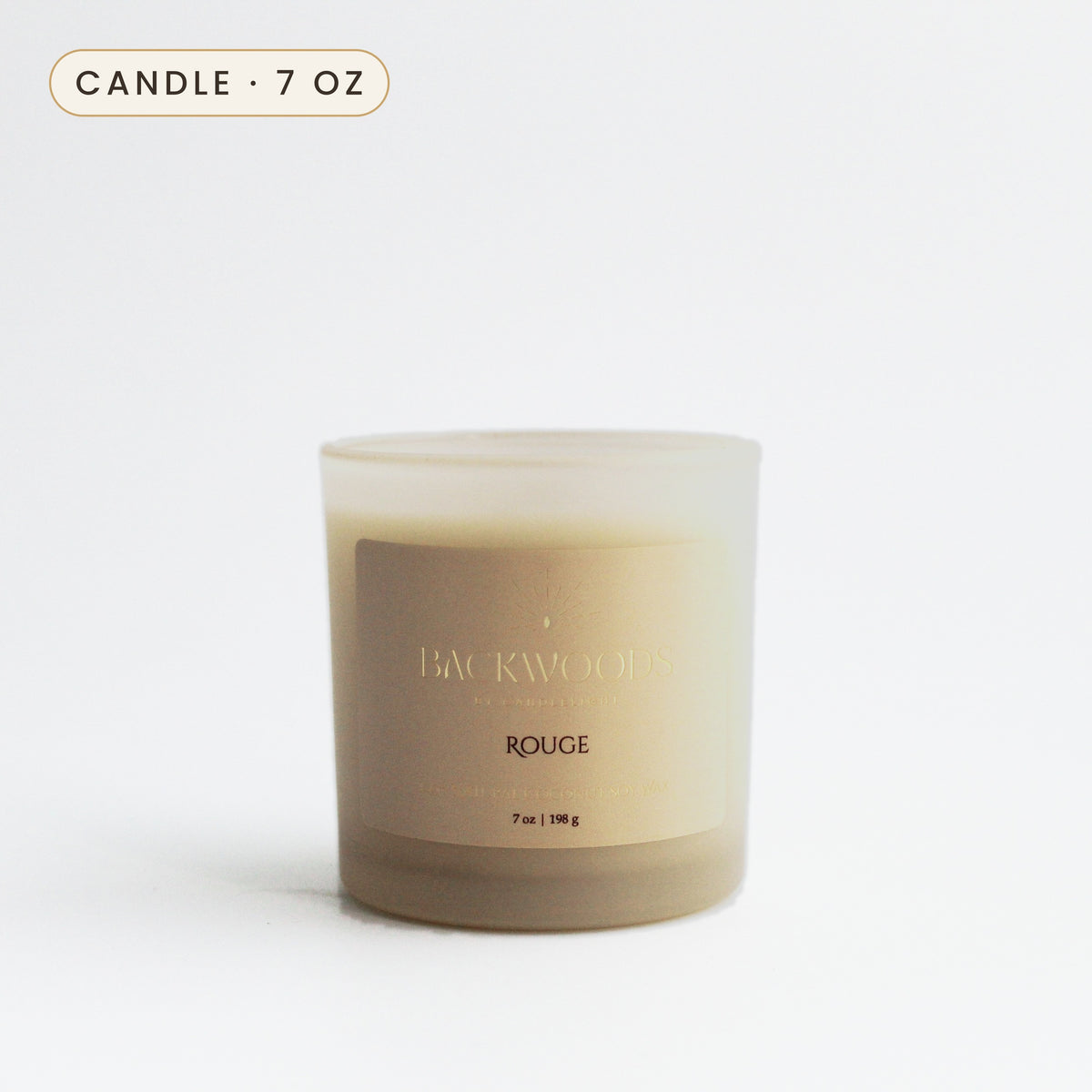 Rouge 7 oz candle in a frosted ivory jar with a gold foil label