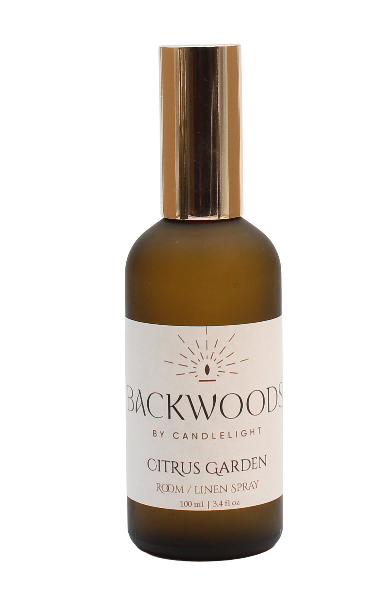 Room spray bottle labeled 'Backwoods by Candlelight Citrus Garden' on a white background