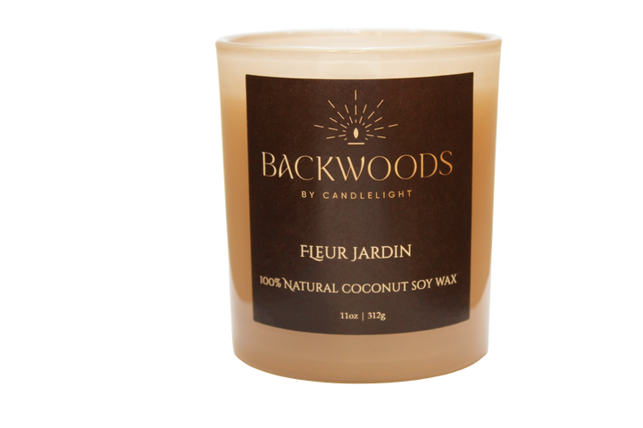 Backwoods By Candlelight all natural candle, non-toxic candle. Fleur Jardin handmade candle and wooden wick on transparent background.