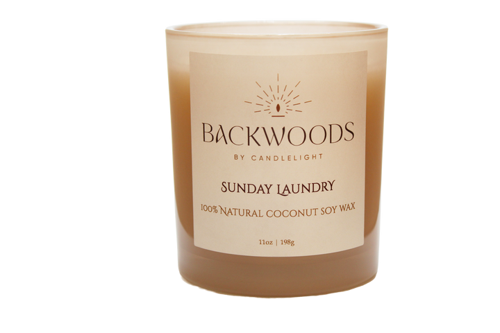 Backwoods By Candlelight all natural candle, non-toxic candle. Sunday Laundry handmade candle and wooden wick on transparent background.